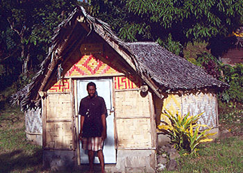 Reddy in front of the 6 Horseshoes Kava Bar.